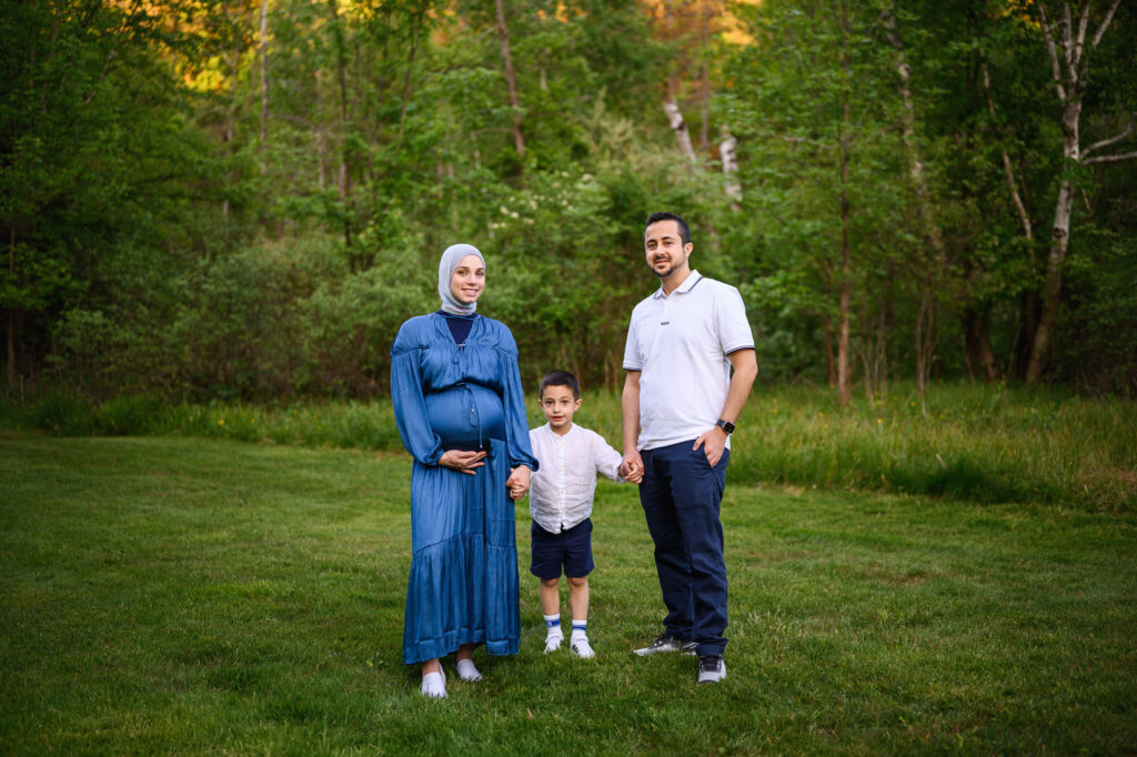 Family of three at a park in Grand Rapids, MI for a maternity session. 