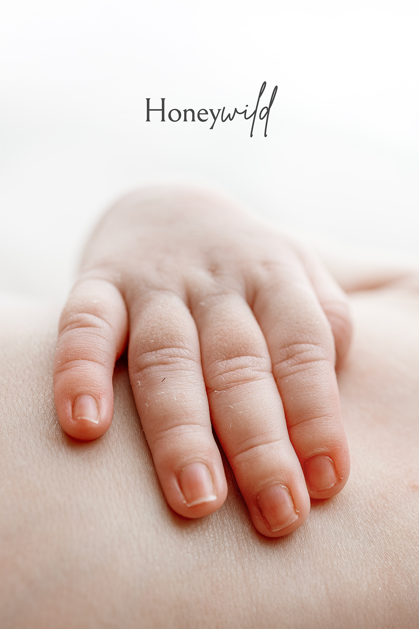 Newborn detail photograph showing tiny fingers during an unhurried newborn photography session