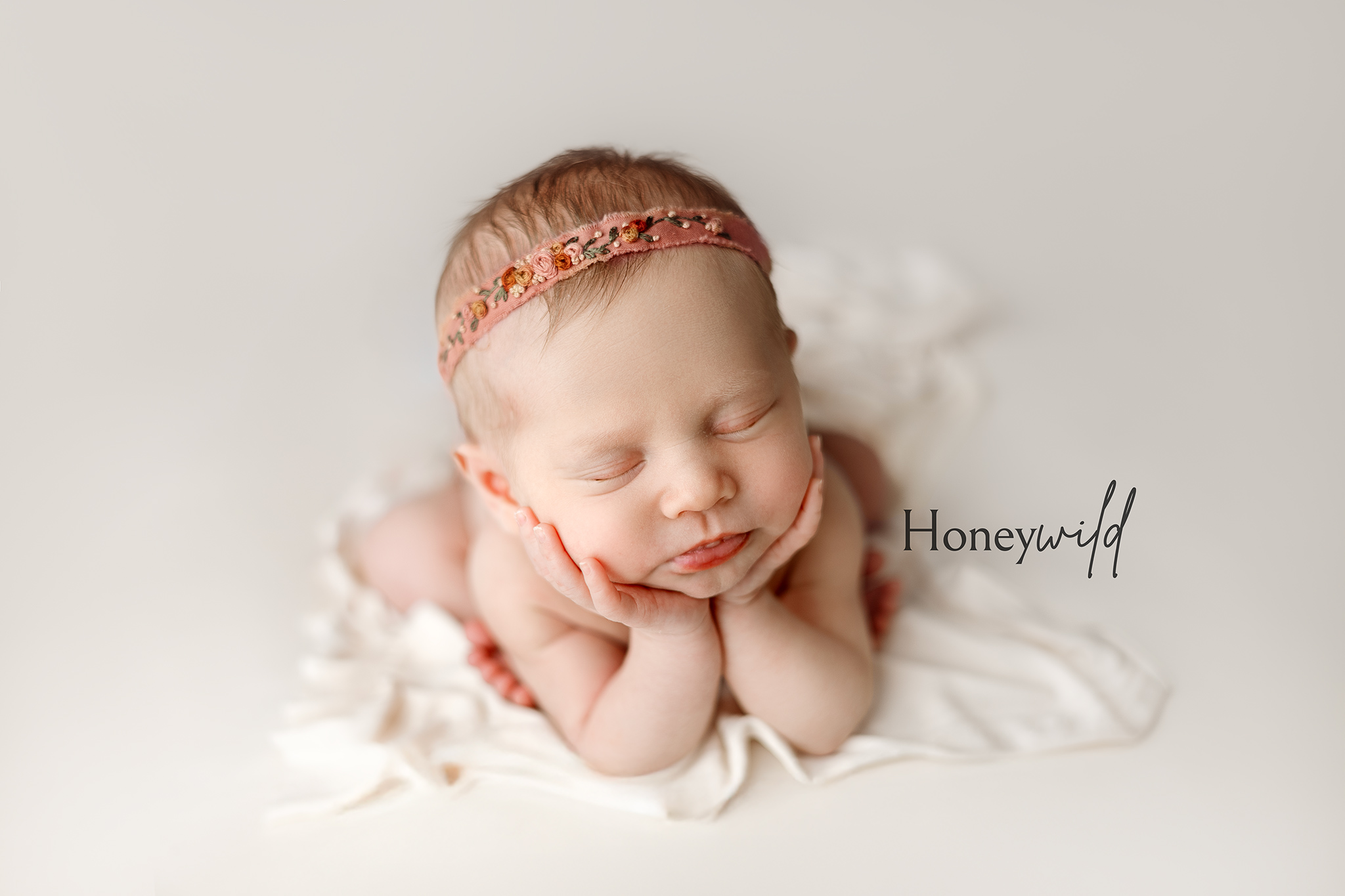 Simple, timeless newborn portrait photographed in a calm Grand Rapids newborn photography studio