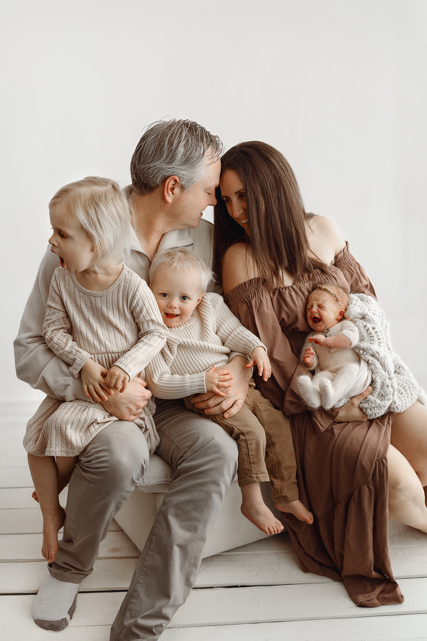 Soft and emotional newborn family photography portrait
