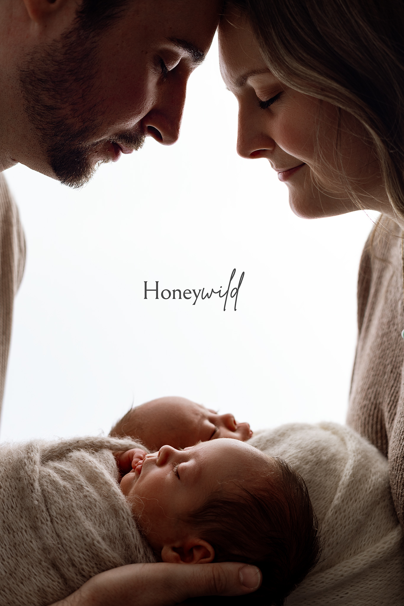 Wrapped newborn portrait created in Grand Rapids photography studio
