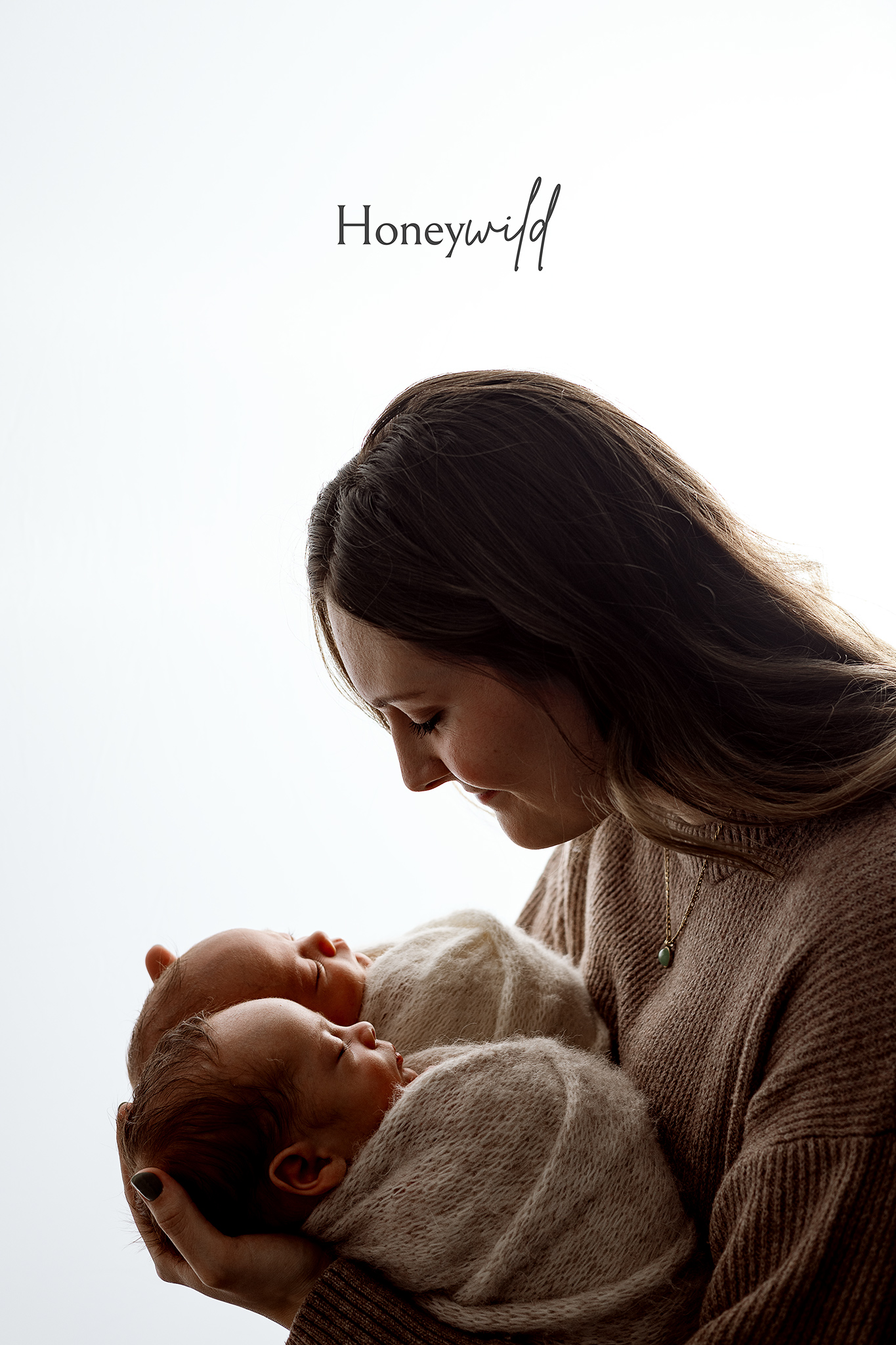 Professional posed newborn session by Honeywild Photography