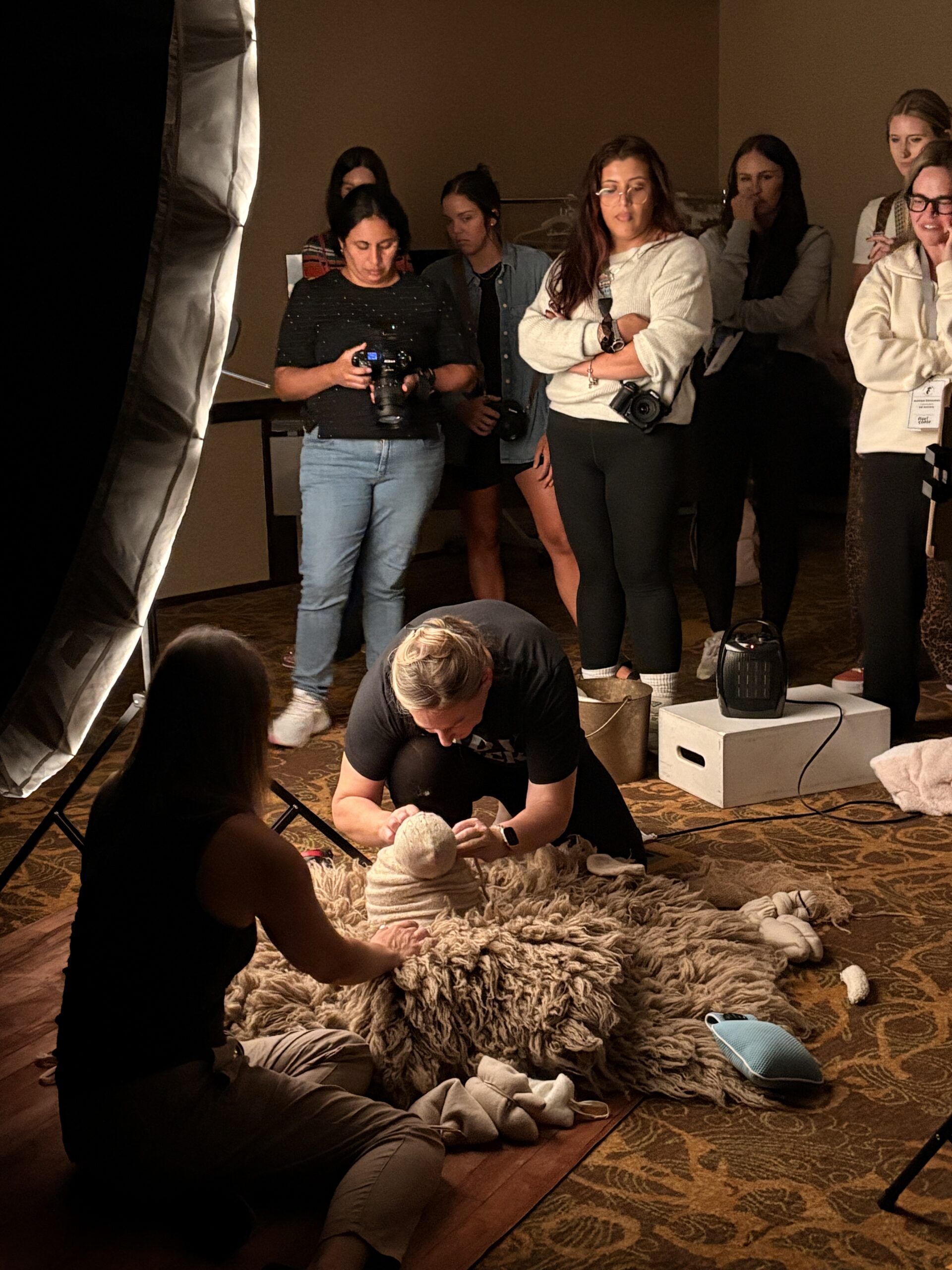 Evie lynn leading a class on newborn photography https://evielynnstudio.com